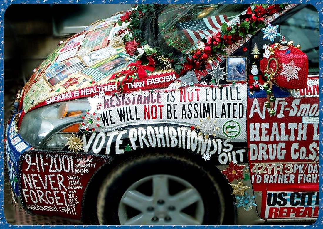 close up photograph of driver's side front of smoker's rights van Resistance is not futile, we will not be assimilated, and vote prohibitionists out