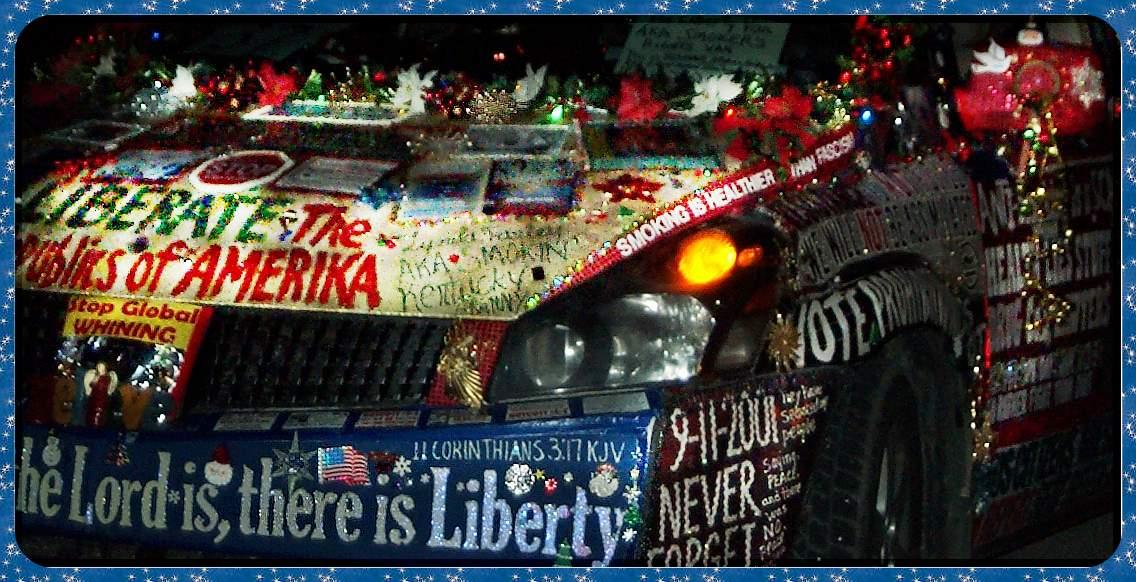 close up of hood, driver's side corner, with Christmas decorations and lights, at Christmas parade at Cave City, Kentucky